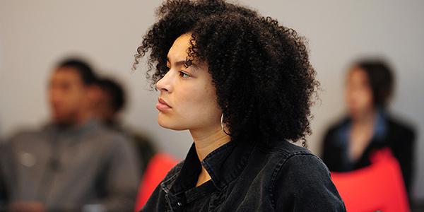 female student staring off into the distance